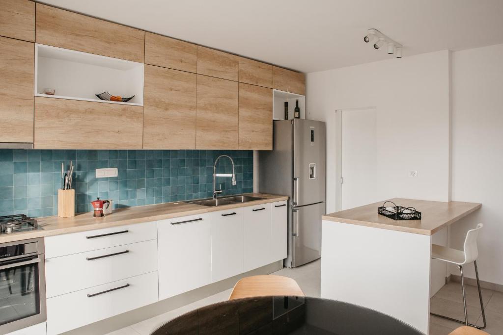 Kuchyňa alebo kuchynka v ubytovaní Cozy apartment GALA