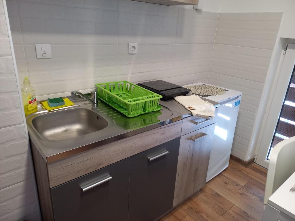 Kuchyň nebo kuchyňský kout v ubytování Apartman Tanja