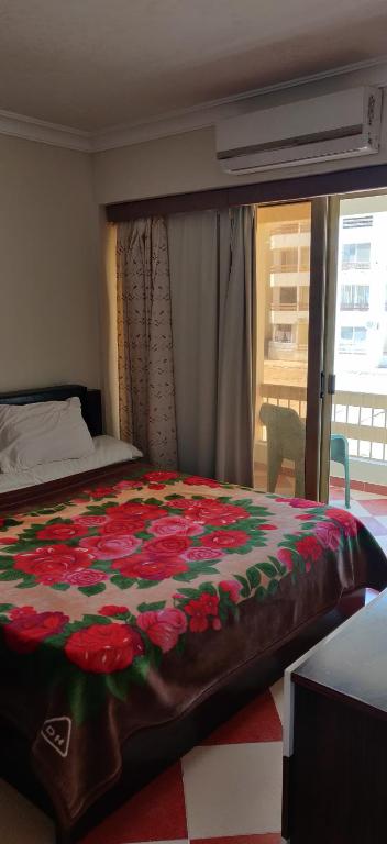 En eller flere senger på et rom på 2bedroom apartment in Summer Land Beach Resort