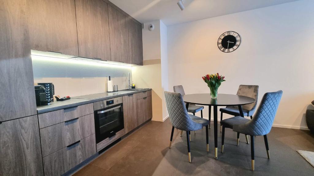 Kuchyňa alebo kuchynka v ubytovaní NOOK NOOK Apartments Bytkowska 103