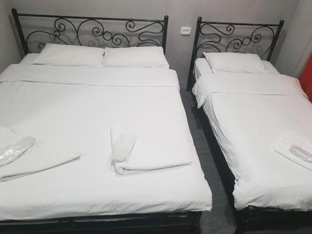 Postel nebo postele na pokoji v ubytování Hotel Ragnar