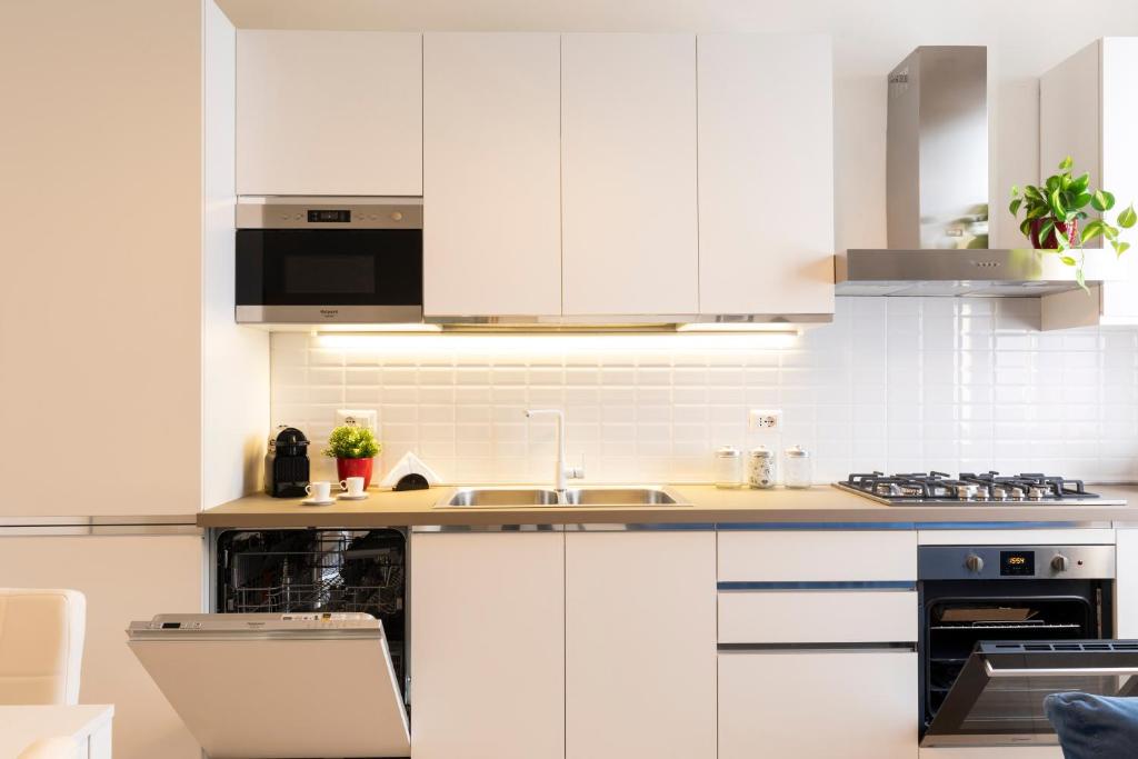 Kuchyňa alebo kuchynka v ubytovaní BICOCCA HOME - 2 Bedrooms