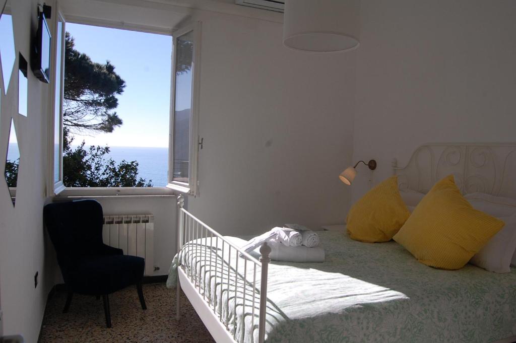 Łóżko lub łóżka w pokoju w obiekcie Corniglia Dreams