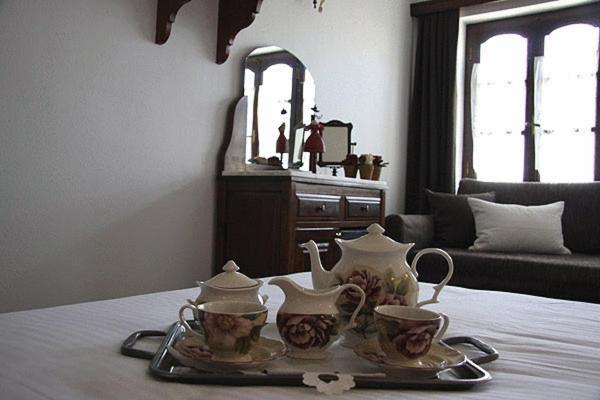 Příslušenství pro přípravu čaje a kávy v ubytování Hotel Petrino