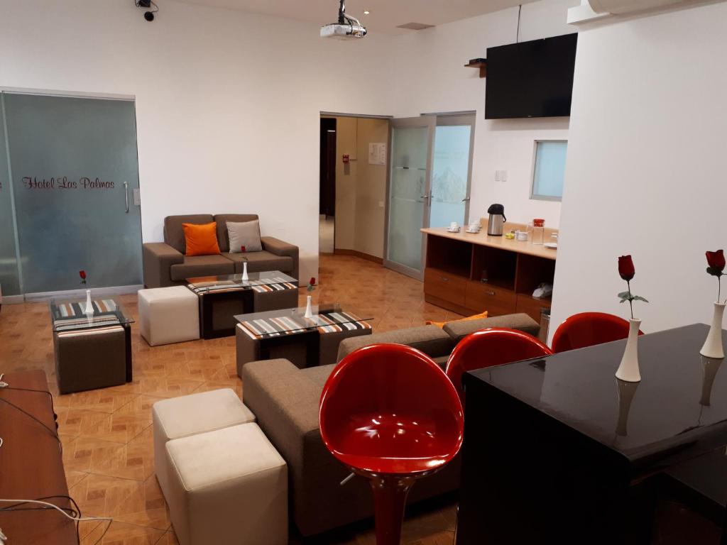 TV a/nebo společenská místnost v ubytování Hotel Las Palmas