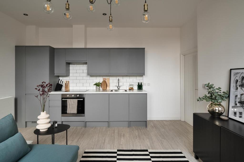 Kuchyň nebo kuchyňský kout v ubytování OneFiveSix - Unique Apartments Birmingham