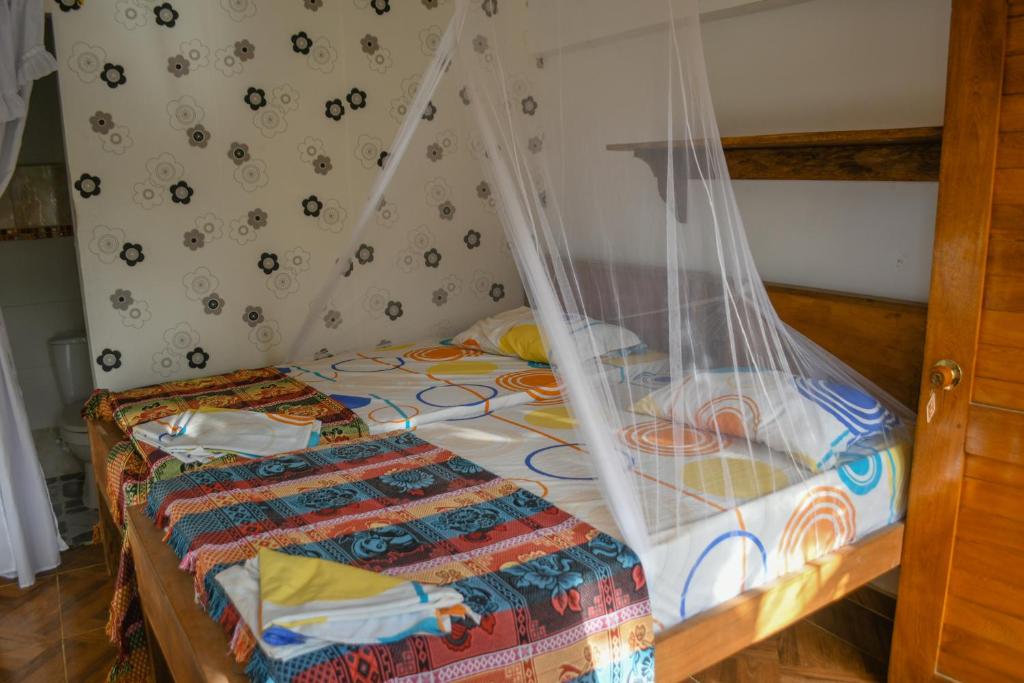 Postel nebo postele na pokoji v ubytování L' Europe