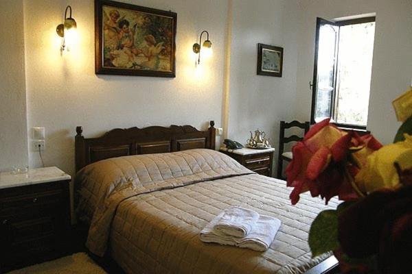 Postel nebo postele na pokoji v ubytování Hotel Petrino