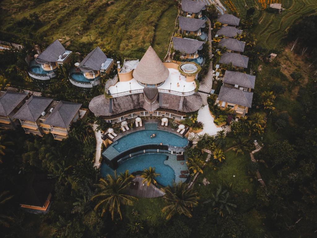an aerial view of a resort with a swimming pool at Wapa di Ume Sidemen in Sidemen