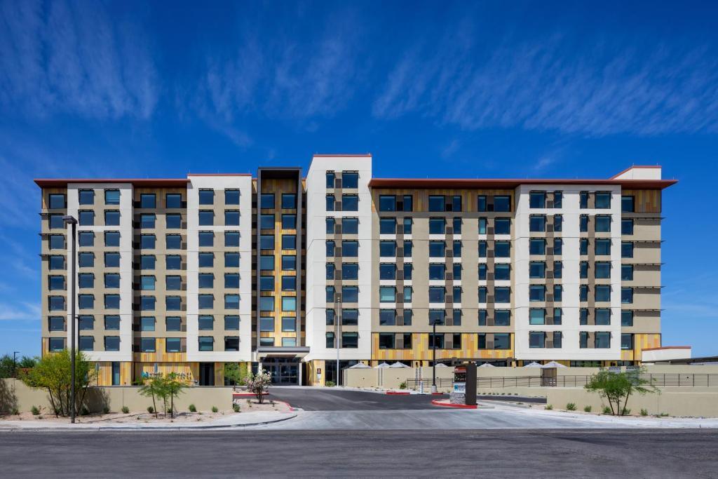 a large white building with a lot of windows at Hyatt House North Scottsdale in Scottsdale