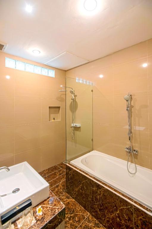 Koupelna v ubytování Graha Socio Hotel Nusa Dua Bali