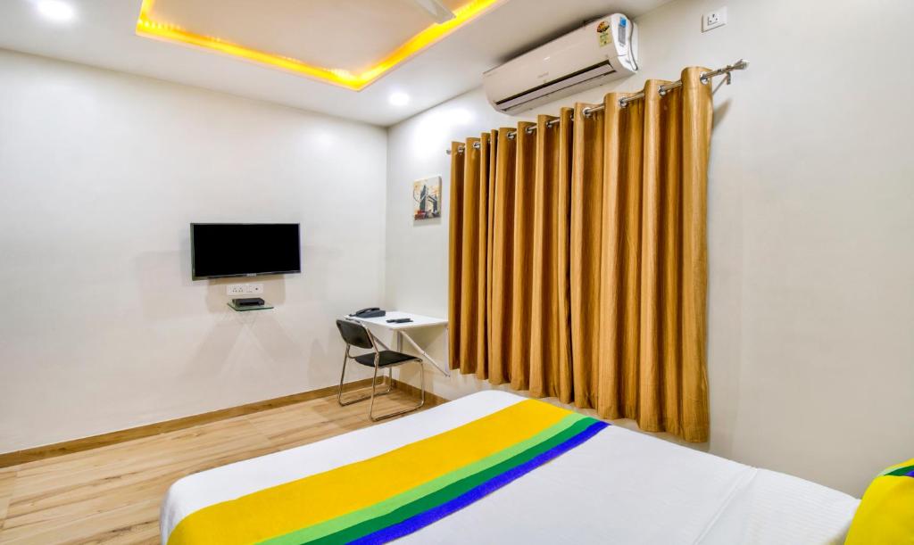 TV a/nebo společenská místnost v ubytování Itsy Hotels Shri Guru Service Apartment
