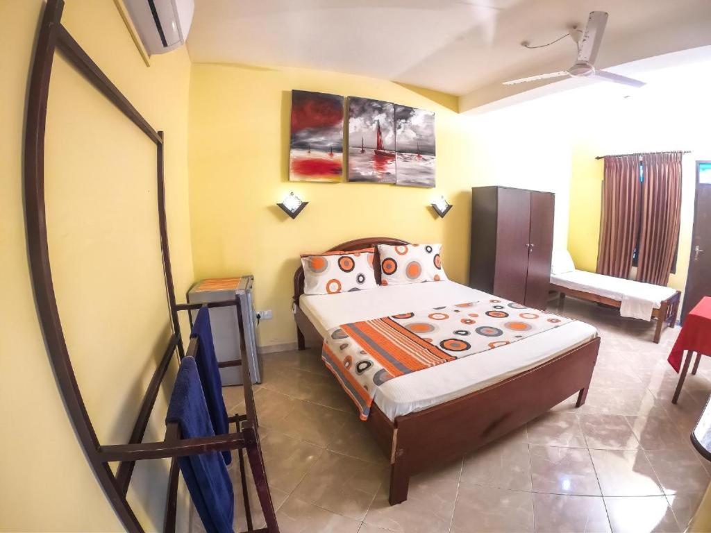 Katil atau katil-katil dalam bilik di Hotel Apollo