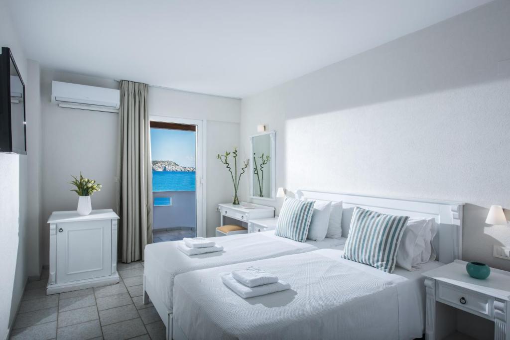 Posteľ alebo postele v izbe v ubytovaní Alexander House Hotel
