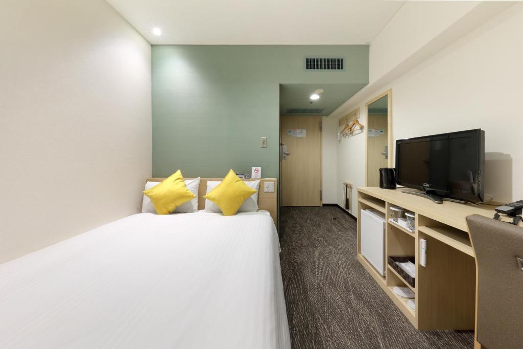 TV a/nebo společenská místnost v ubytování Cityroute Hotel