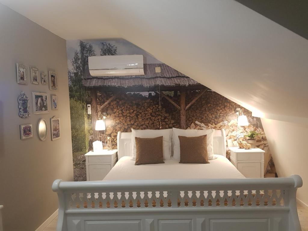 Postel nebo postele na pokoji v ubytování B&B Le Jardin