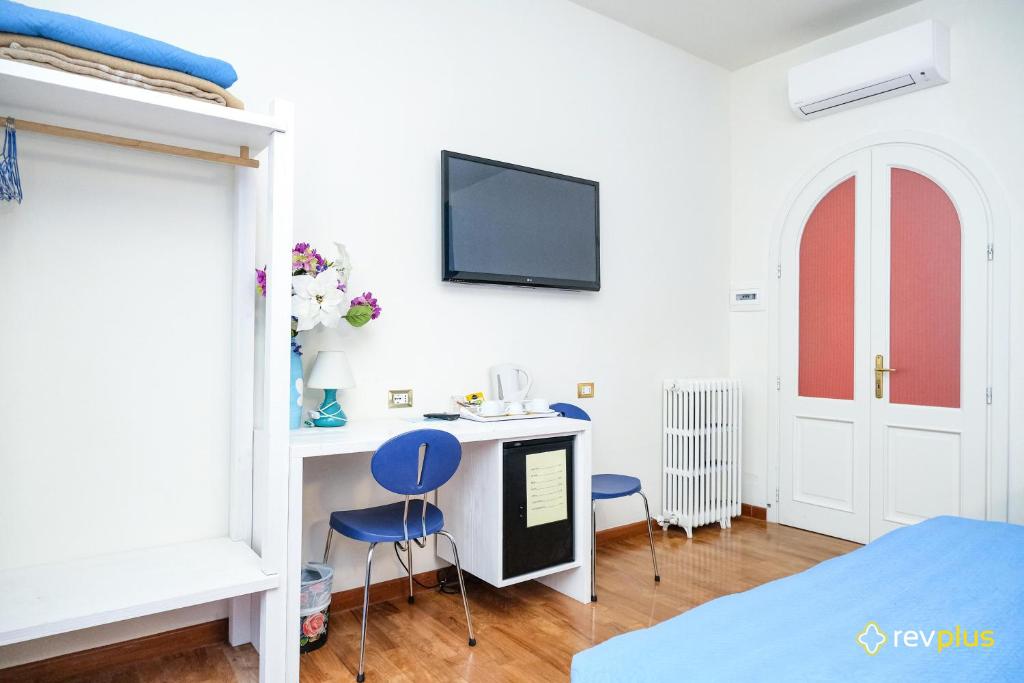 TV a/nebo společenská místnost v ubytování Lia Rooms