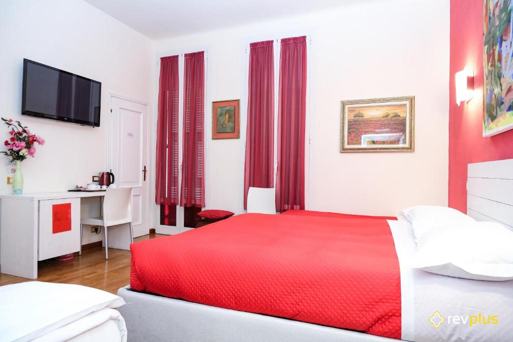 Postel nebo postele na pokoji v ubytování Lia Rooms