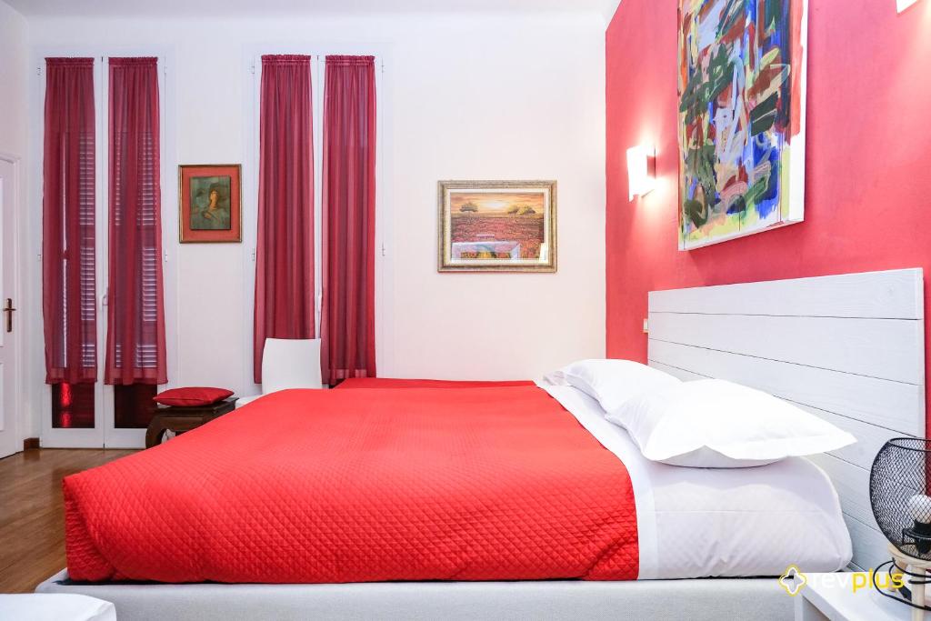 Postel nebo postele na pokoji v ubytování Lia Rooms