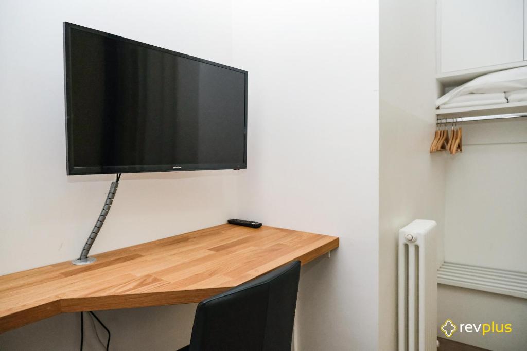 TV a/nebo společenská místnost v ubytování Lia Rooms