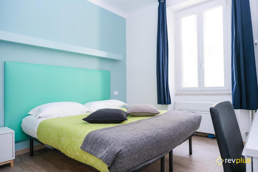 Postel nebo postele na pokoji v ubytování Lia Rooms