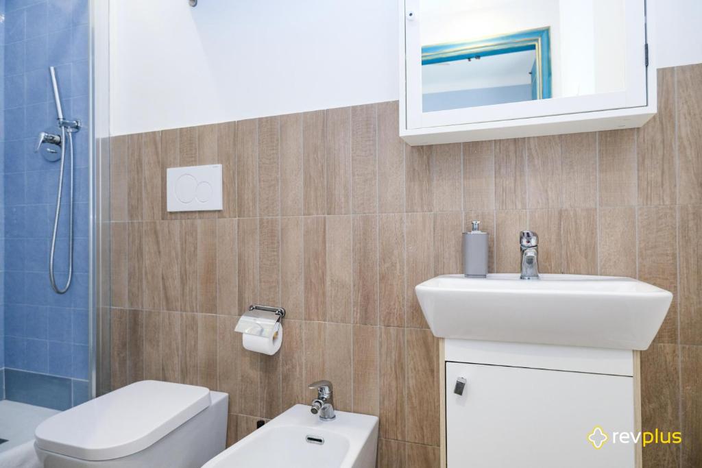 Koupelna v ubytování Lia Rooms