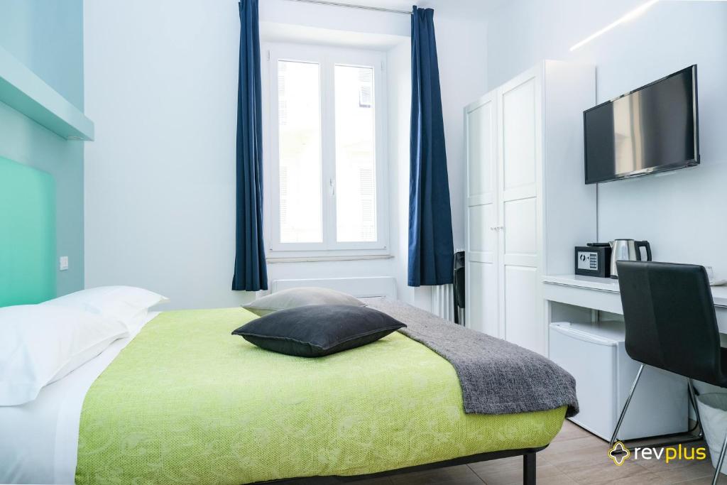 Postel nebo postele na pokoji v ubytování Lia Rooms