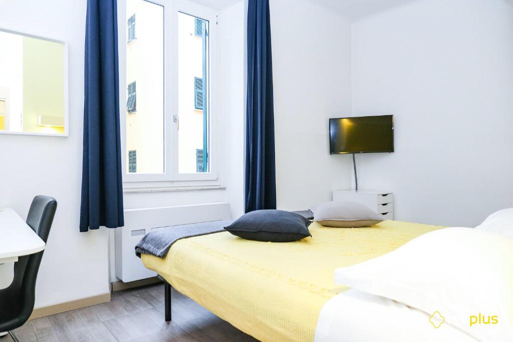 Postel nebo postele na pokoji v ubytování Lia Rooms