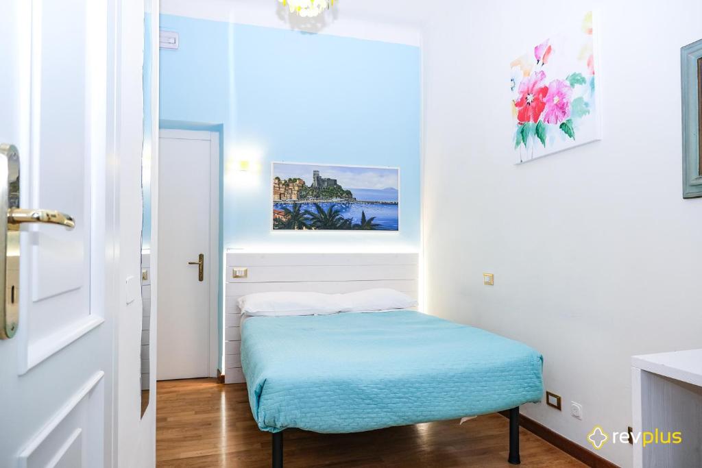 Postel nebo postele na pokoji v ubytování Lia Rooms