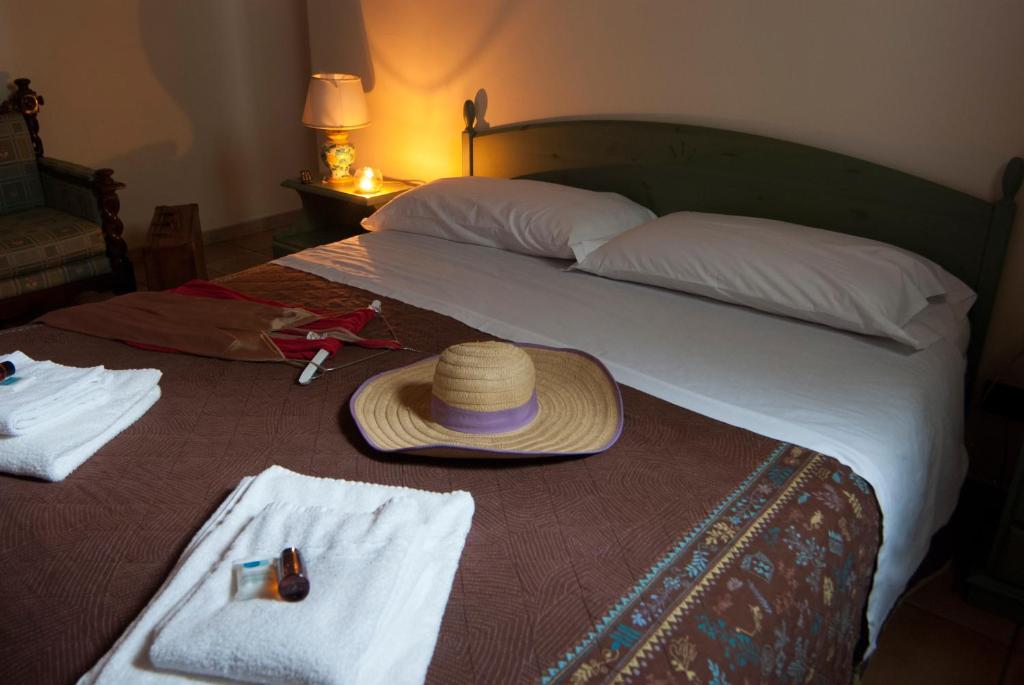 Postel nebo postele na pokoji v ubytování Agriturismo Al Casale