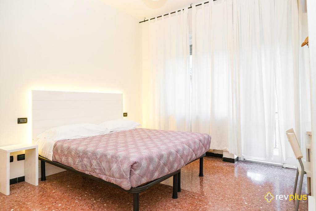 Postel nebo postele na pokoji v ubytování Lia Rooms 3