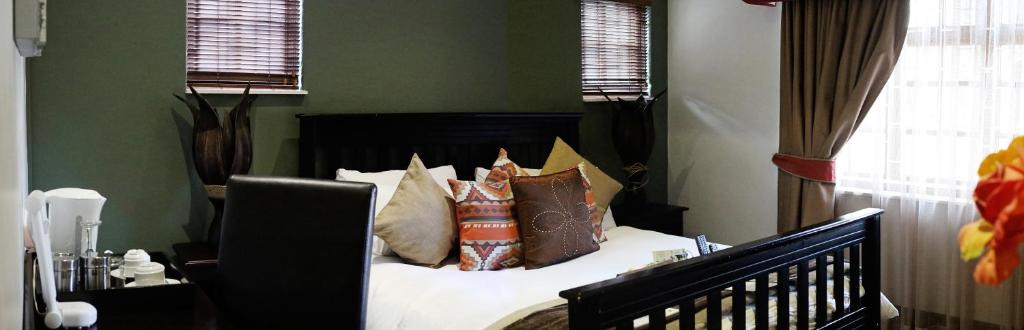 Postel nebo postele na pokoji v ubytování Moonriver Guesthouse