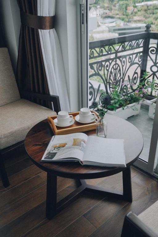 Posezení v ubytování La Pense'e Hotel - Dalat