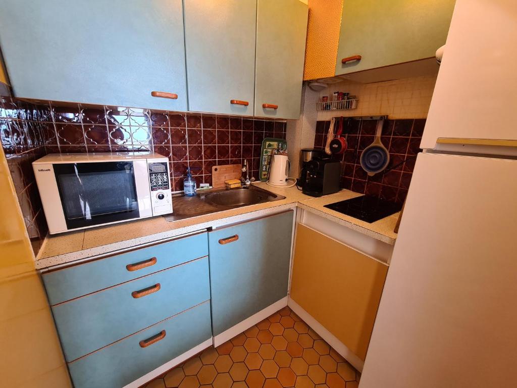 Kuchyň nebo kuchyňský kout v ubytování Appartement vue mer / Carnon Plage