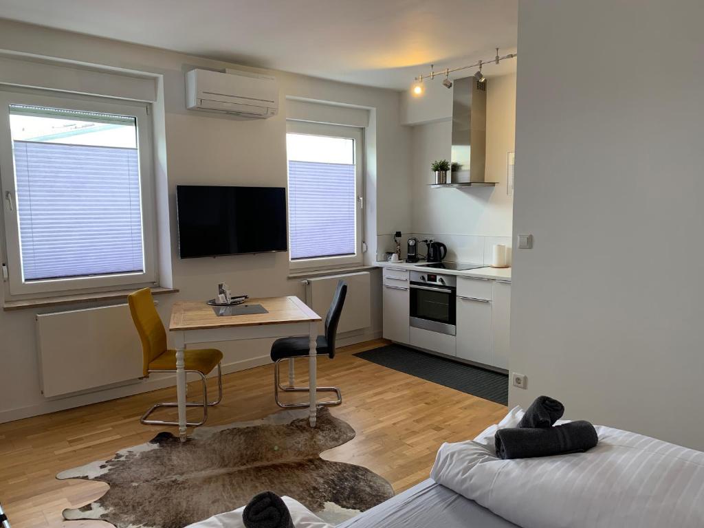 Kuchyň nebo kuchyňský kout v ubytování Hotel Prinz Carl - Apartments mit Klimaanlage