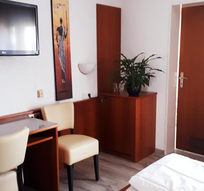 Postel nebo postele na pokoji v ubytování Hotel Park Eden