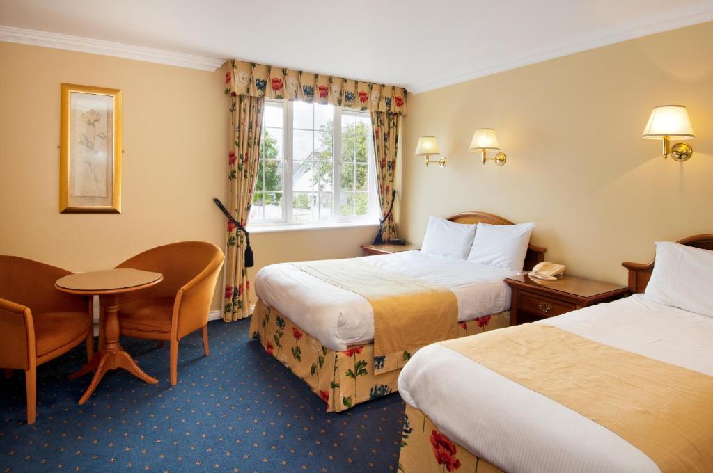 Letto o letti in una camera di Old Weir Lodge