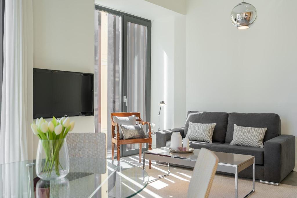 A television and/or entertainment centre at iloftmalaga Calle Cisneros