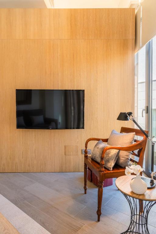 A television and/or entertainment centre at iloftmalaga Calle Cisneros