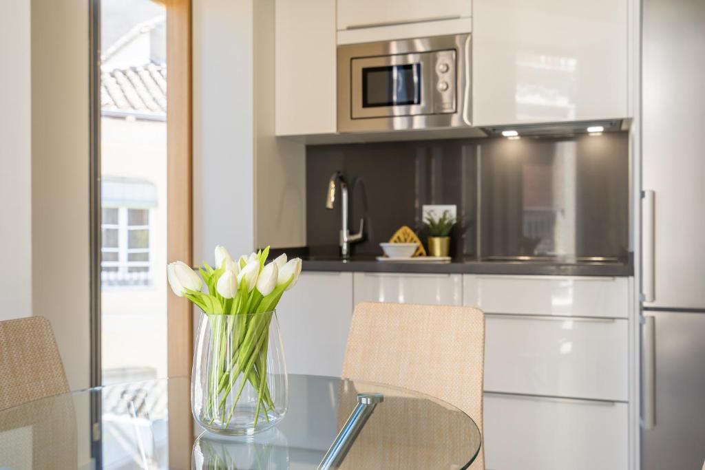 A kitchen or kitchenette at iloftmalaga Calle Cisneros