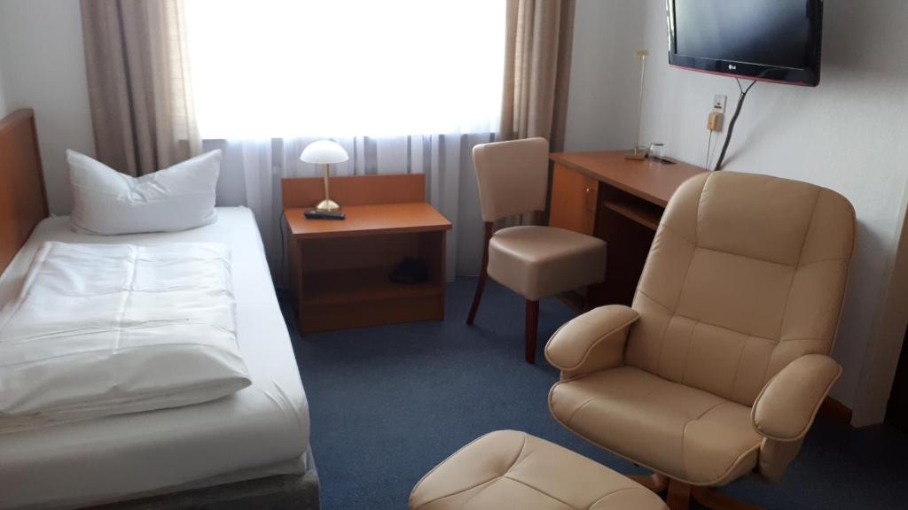 TV a/nebo společenská místnost v ubytování Hotel Park Eden