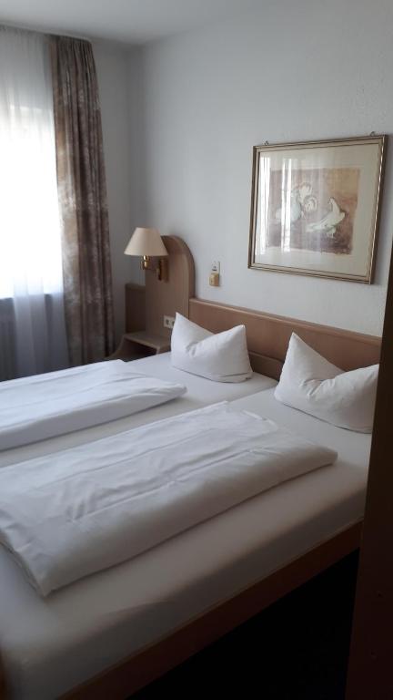 Postel nebo postele na pokoji v ubytování Hotel Park Eden