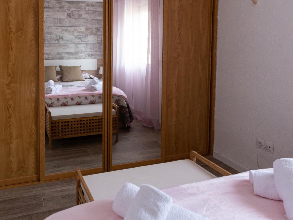 Postel nebo postele na pokoji v ubytování Sunset Beach