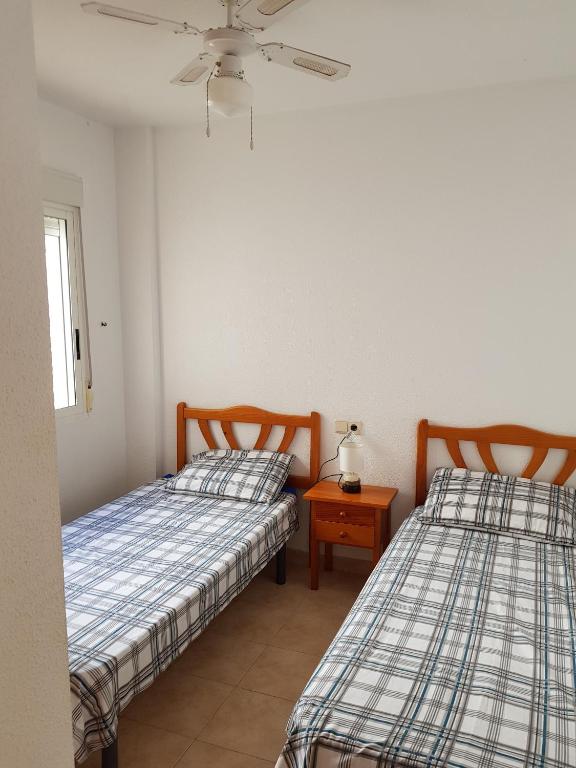 Postel nebo postele na pokoji v ubytování Casa Maria