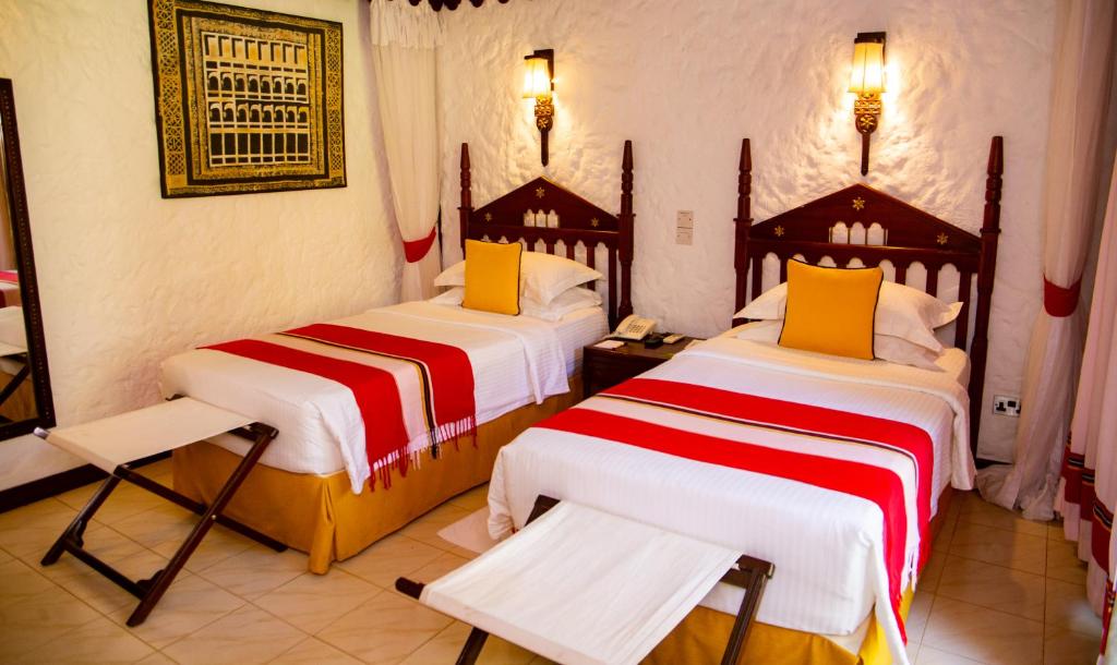 Postel nebo postele na pokoji v ubytování Serena Beach Resort & Spa