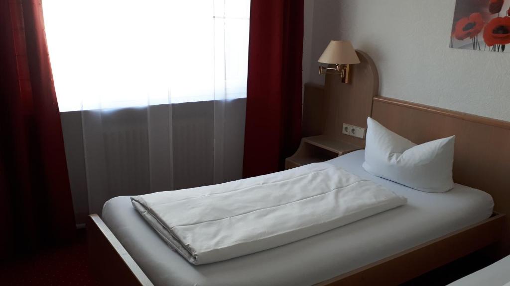 Postel nebo postele na pokoji v ubytování Hotel Park Eden