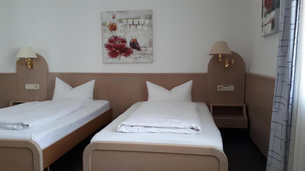 Postel nebo postele na pokoji v ubytování Hotel Park Eden