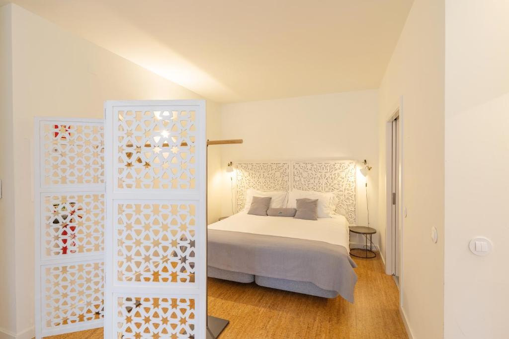 Letto o letti in una camera di Galerias Nightlife Fashion Flats