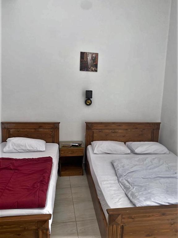 Postel nebo postele na pokoji v ubytování Golden Plaza Dahab Resort