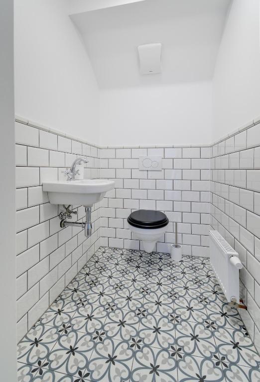 Koupelna v ubytování Apartmány Hájovna